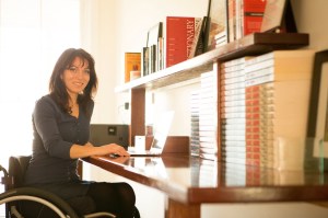 Writer Honey Brown at her desk